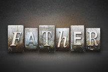 Stone tiles spelling the word Father.