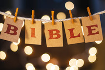 word Bible hanging on clothes pins 