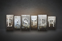 Stone tiles spelling the word EASTER.