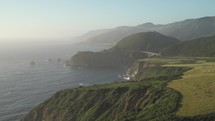 Carmel By The Sea, Big Sur and Bixby Creek Bridge from Distance - a Rugged Stretch of California Central Coast known for Winding Roads, Seaside Cliffs and Coastline