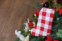 red and white gingham Christmas stocking 