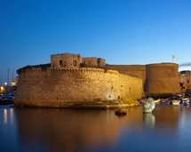 Angevin Castle of Gallipoli by night in Salento, Italy
