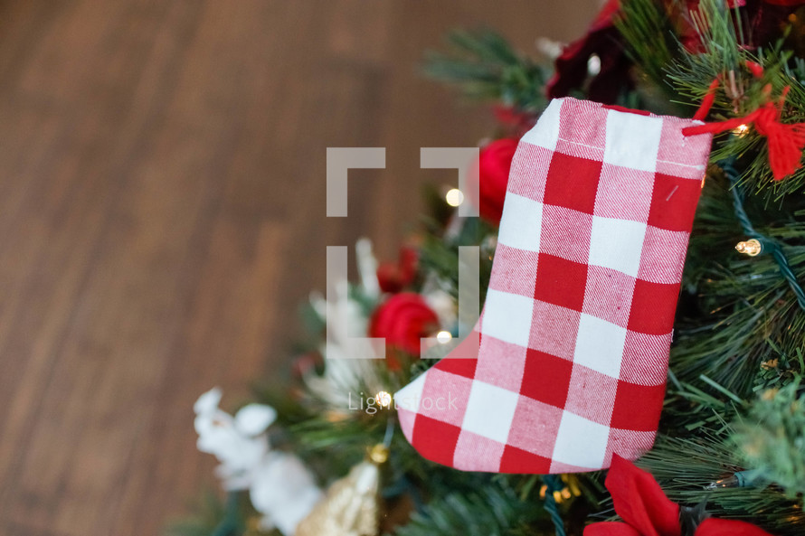 red and white gingham Christmas stocking 