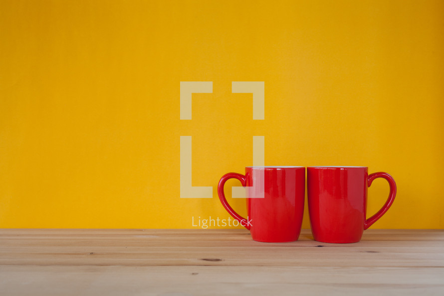 two red coffee mugs