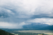 rain clouds above a valley 