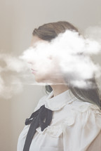 girl with head shrouded in clouds