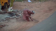 Indian woman working  in a small village outside of the city of  Vizag Visakhapatnam, India