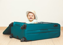 infant in a suitcase 