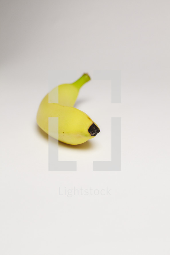 A banana on seamless white