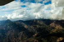 flying over mountains in Kenya 