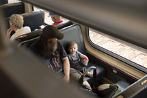 father and son on a train 