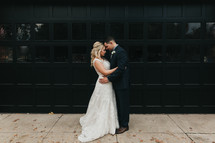 a bride and groom embracing 