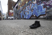 lost shoe in an alley 