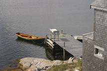 a boat tide to a dock 