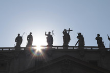 statues on a roof in the vatican in Rome 