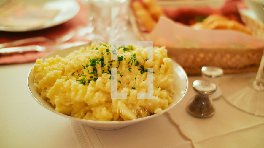 mashed potatoes on a dinner table 