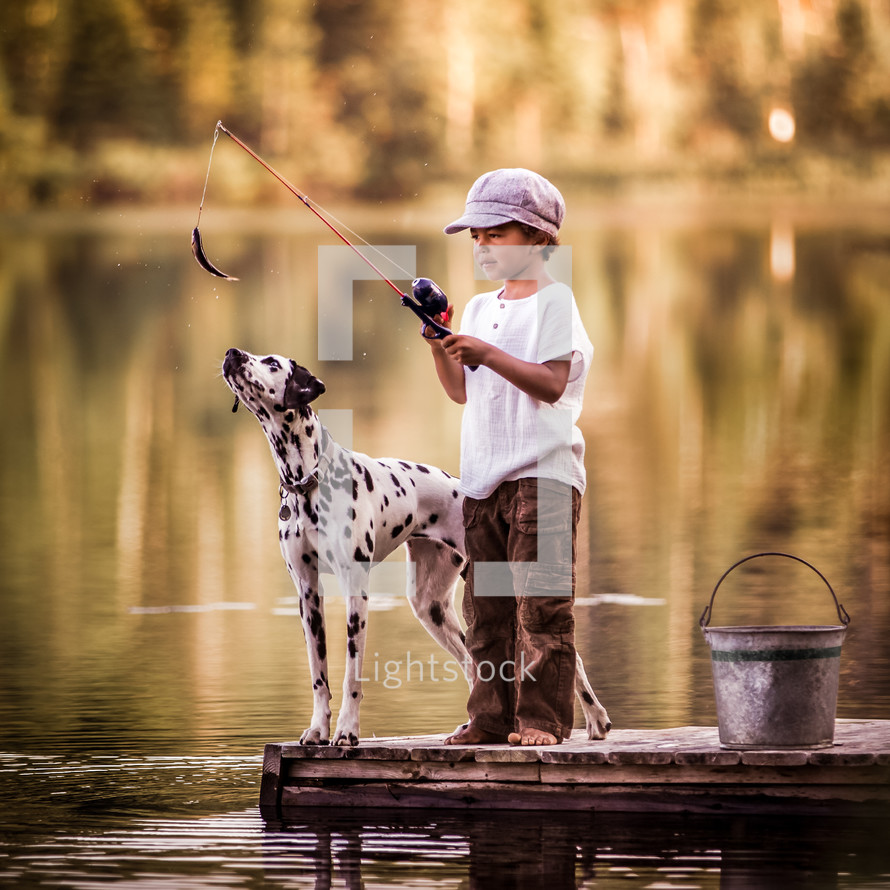 boy and his dog fishing 