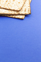 Matzah Bread Unleavened Bread on a Bright Blue Background