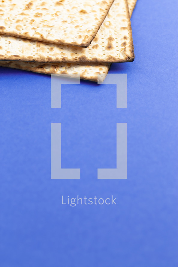 Matzah Bread Unleavened Bread on a Bright Blue Background