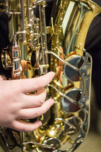 kid playing a saxophone 