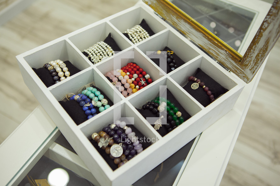 Gemstones handmade Bracelets on Shop-window. Fashion accessories
