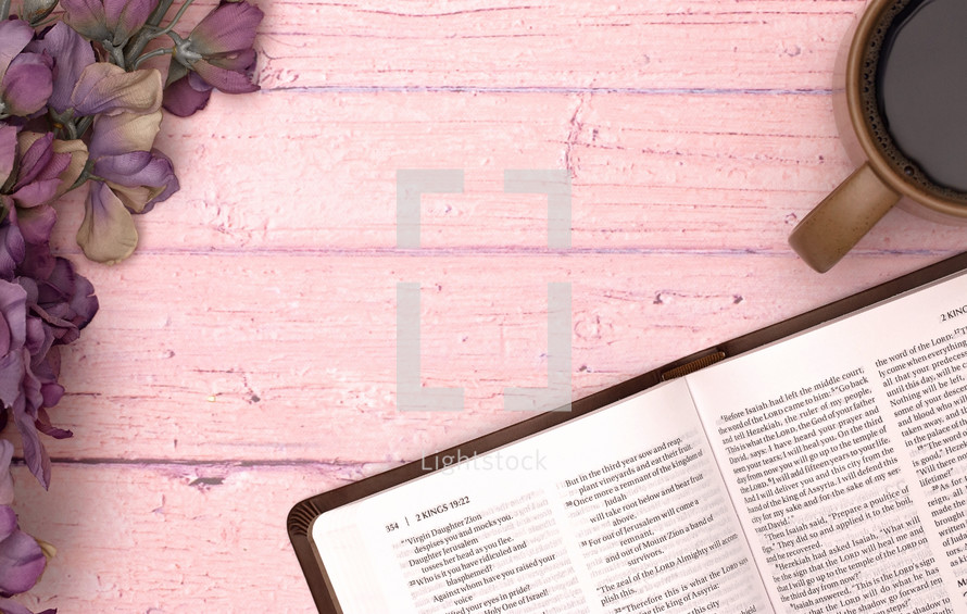 Personal Bible Study with a Cup of Hot Coffee on a Pink Table