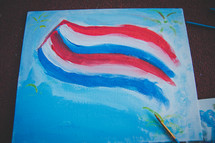 red, white, and blue paint on canvas 