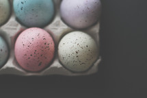 speckled pastel Easter Eggs in a carton 