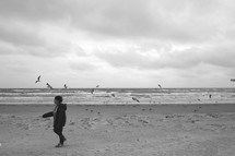 child walking on a beach 