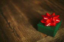 A Christmas present on a wooden table