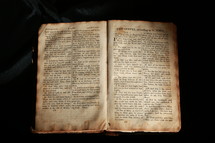 Open worn Bible in the book of John