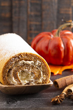 Pumpkin Spice Roll with Cream Cheese Frosting and Powdered Sugar