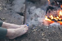 barefoot by a fire 