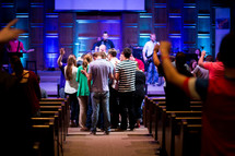 group prayer at a worship service 