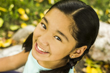 a smiling Asian little girl 