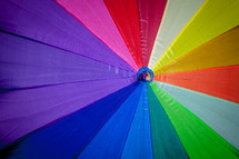 radiating rainbow umbrella top
