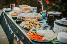 food on an outdoor table 