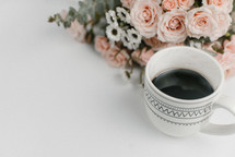 coffee mug and flowers 