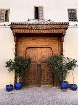 large ornate double wooden doors 