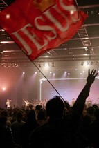 Jesus flag in the audience at a concert 