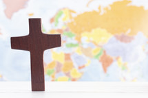 wooden cross and map 