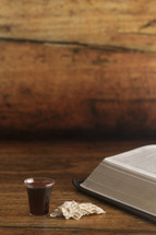 communion elements and open Bible 