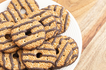 Fudge Striped Shortbreak Cookies on a Wooden Kitchen Table