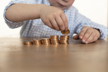 a boy child counting money