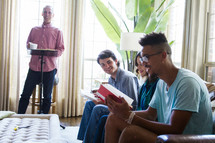 man leading a group Bible study discussing scripture 
