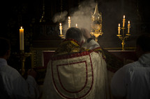 priest with incense 