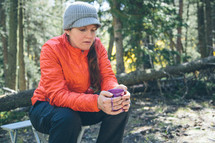 woman camper holding a coffee mug 