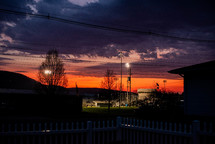 sky at sunset above a ballpark 