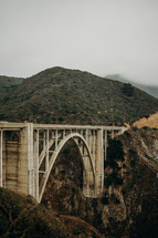 bridge connecting two mountains 