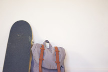 book bag and skateboard